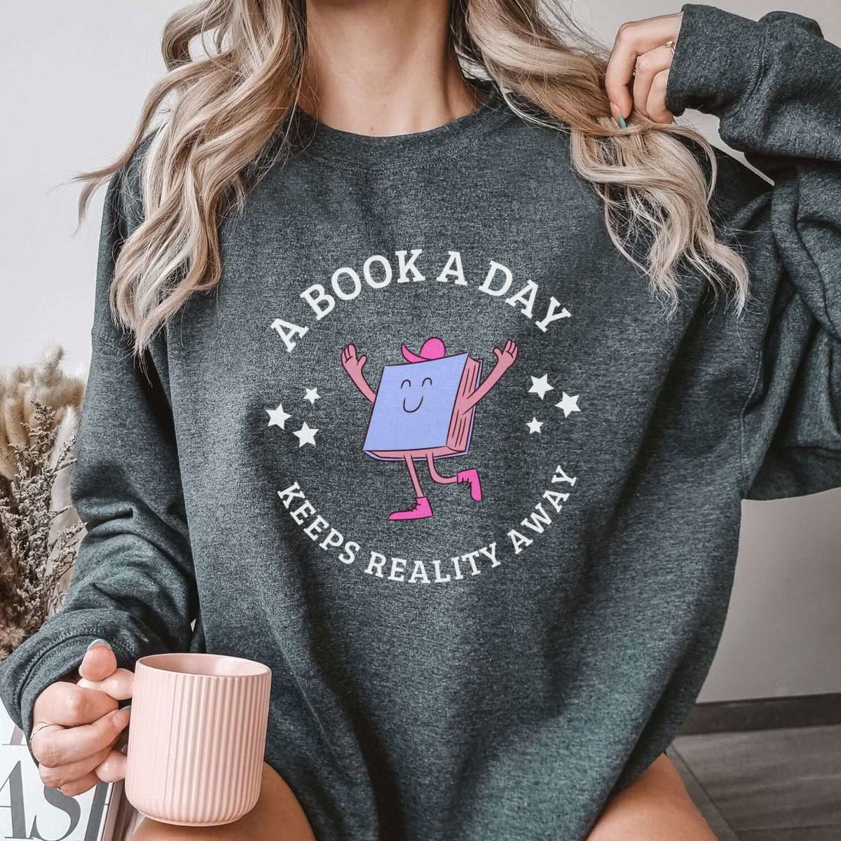 A Book a Day Keeps Reality Away Sweatshirt - Bookish Queen