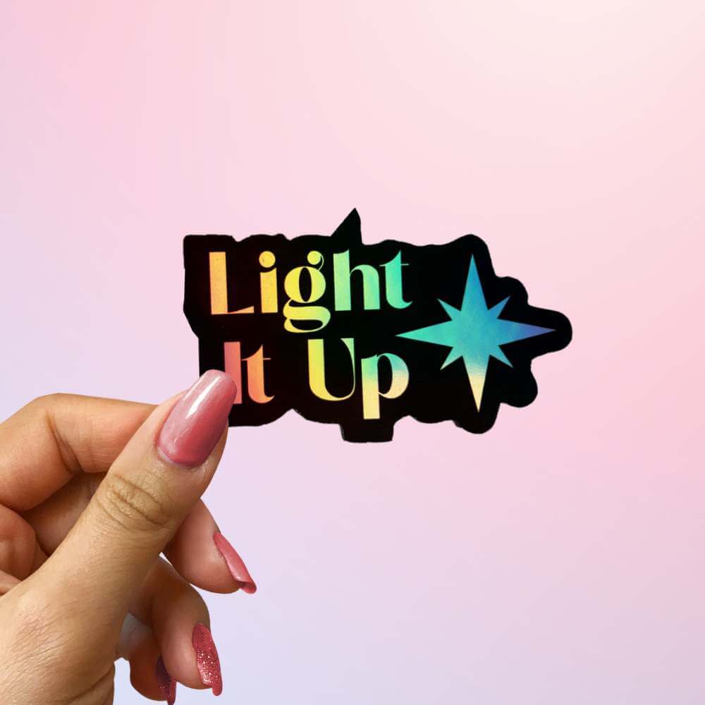 Light It Up quote sticker from Crescent City in rainbow holographic vinyl