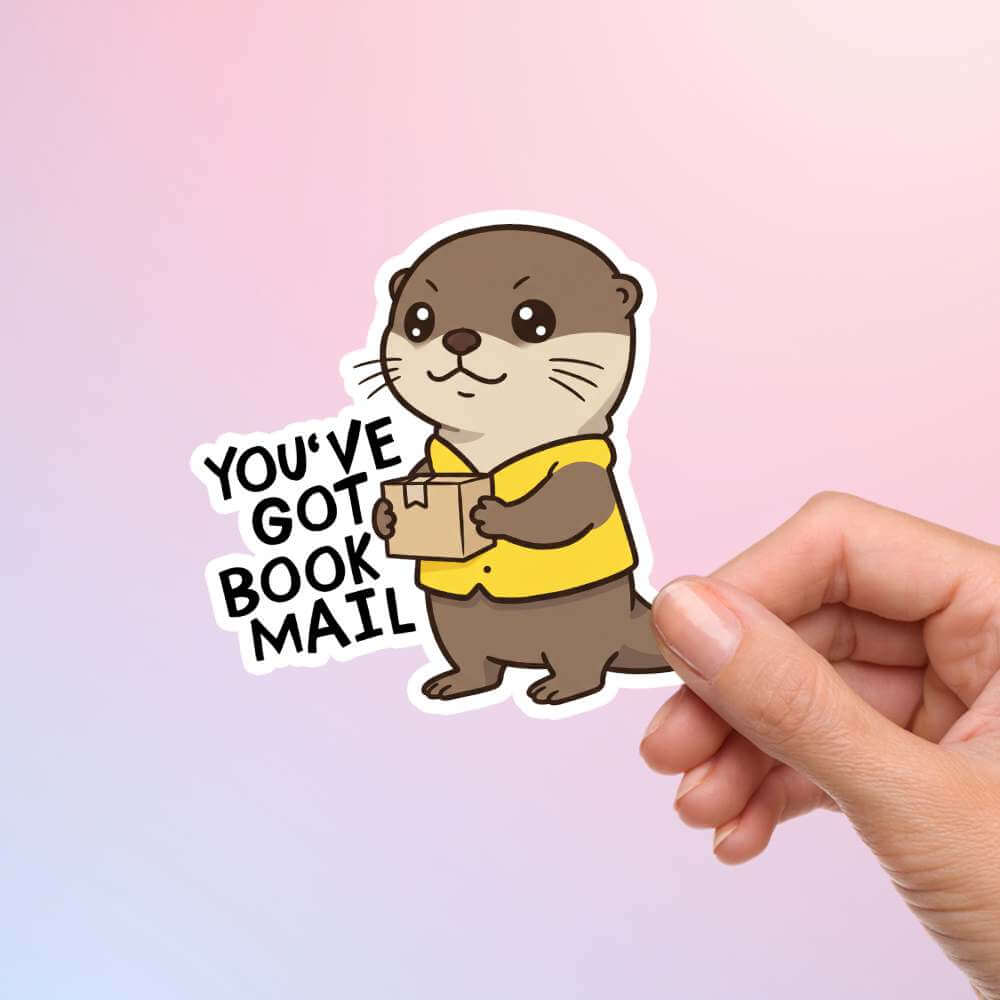 Crescent City otter sticker in chibi style delivering book mail