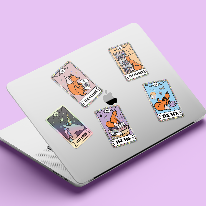 cute tarot stickers on a laptop