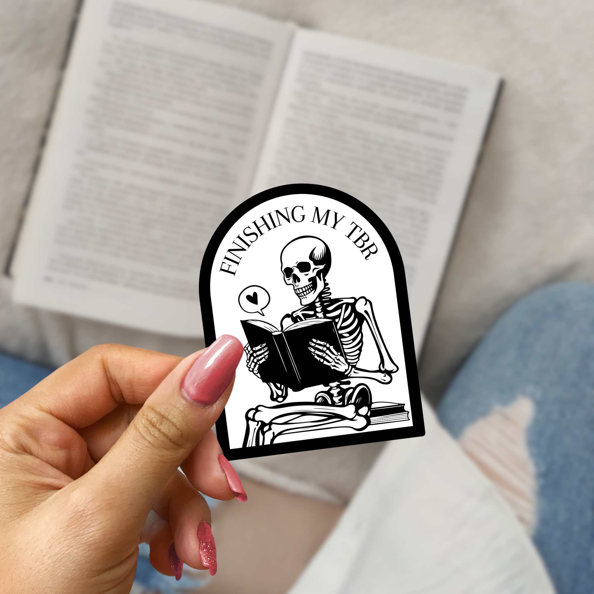 Funny bookish sticker with Death by TBR skeleton design