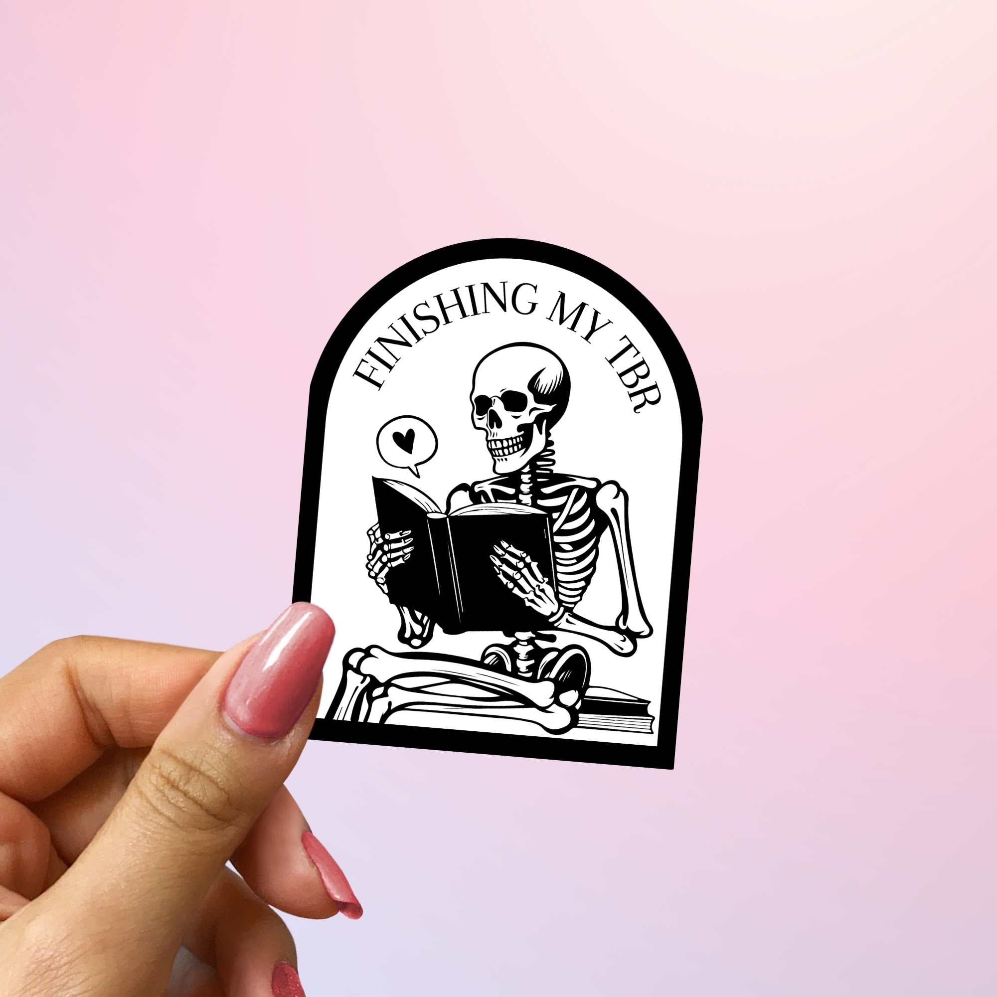 Booktok-inspired reading skeleton sticker for bookworms