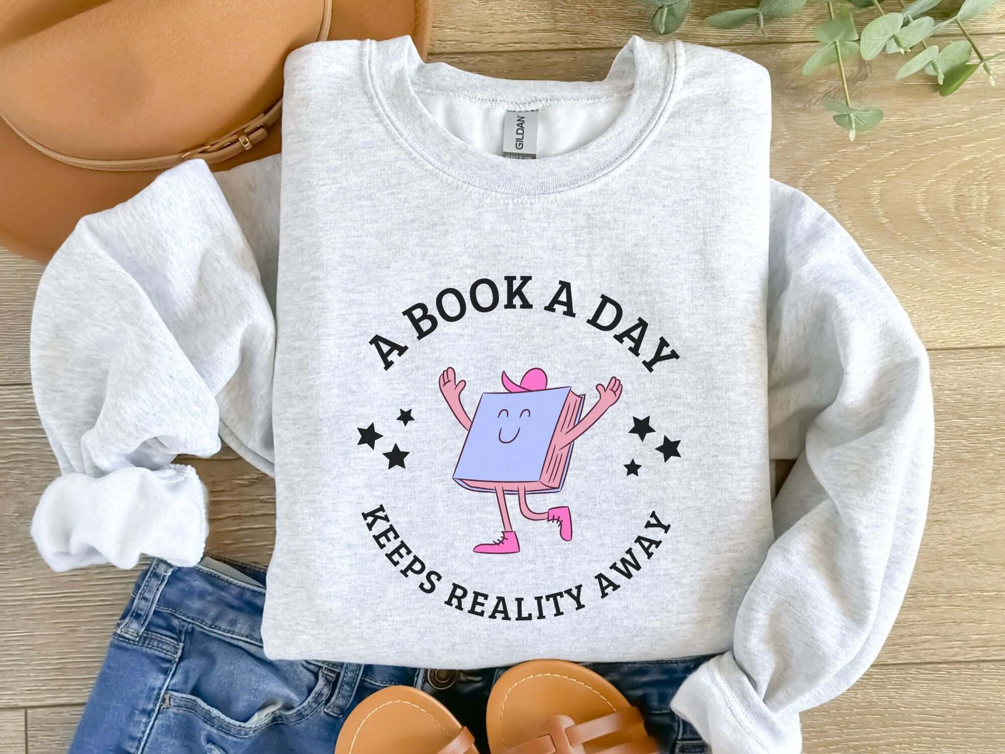 bookish sweatshirt a book a day keeps reality away funny mental health