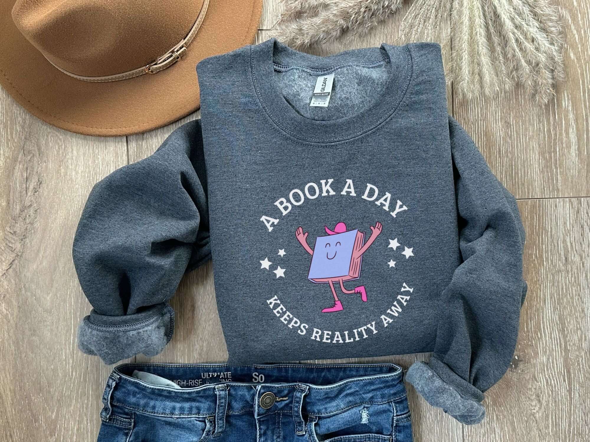 bookish sweatshirt a book a day keeps reality away funny mental health