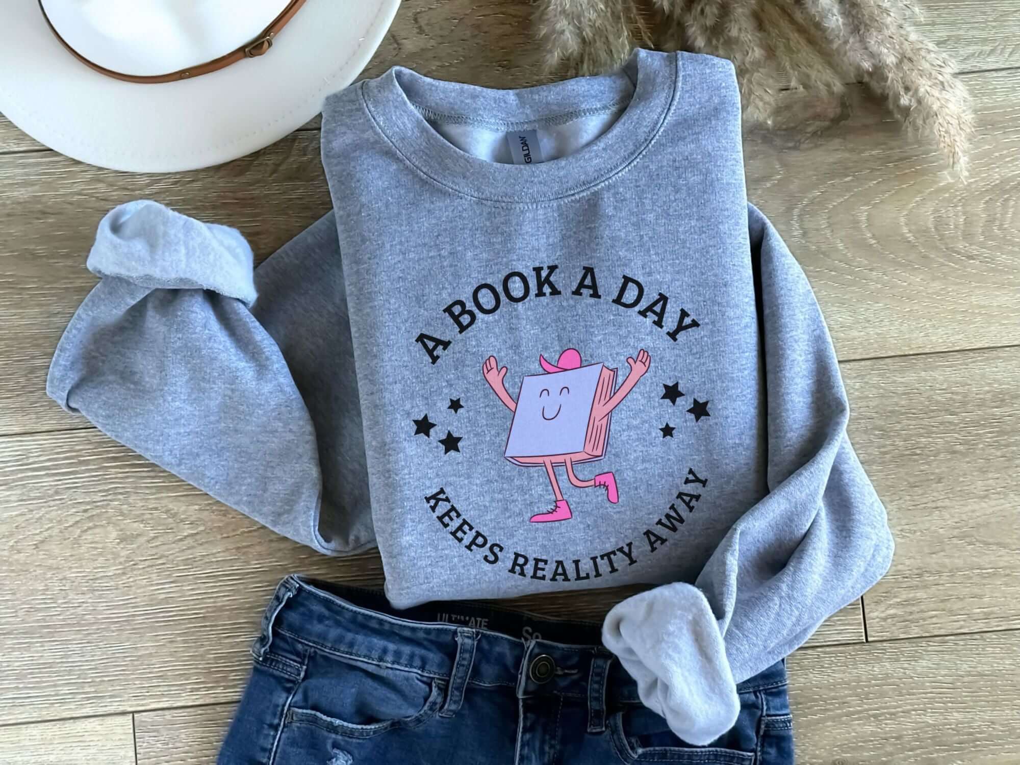 bookish sweatshirt a book a day keeps reality away funny mental health