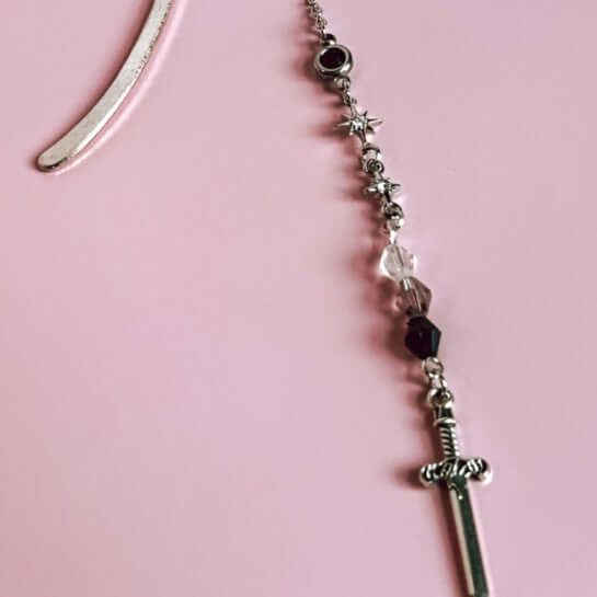 Fantasy-themed book mark with dagger and beads